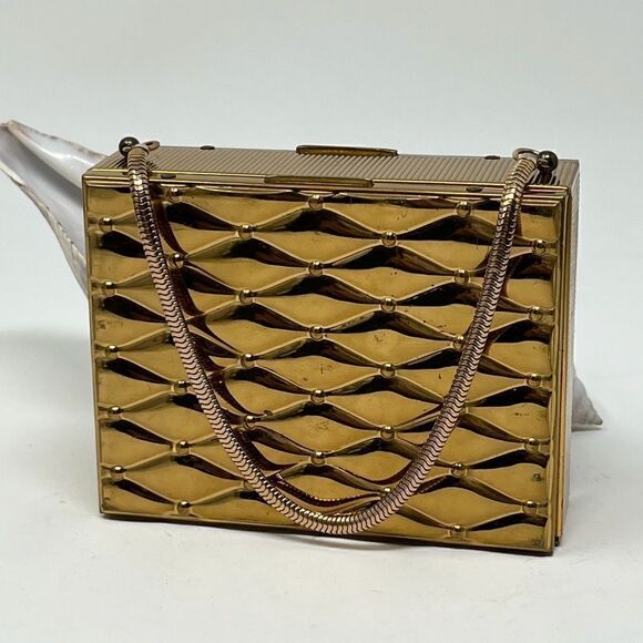Vintage, gold tone compact/purse.  